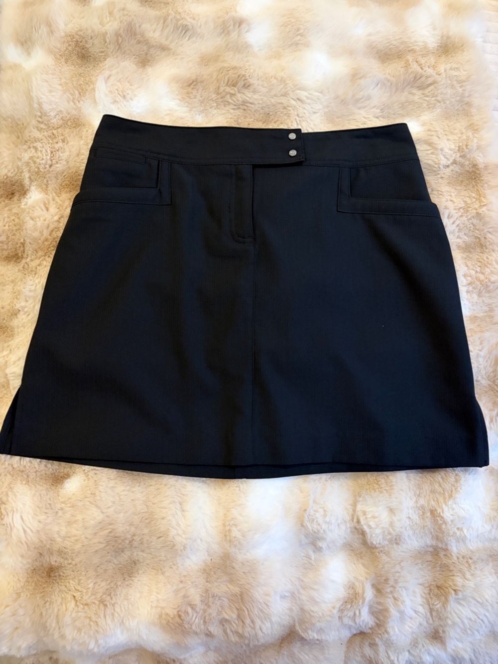 Izod Black golf skirt with Front Pocket Detail size 4